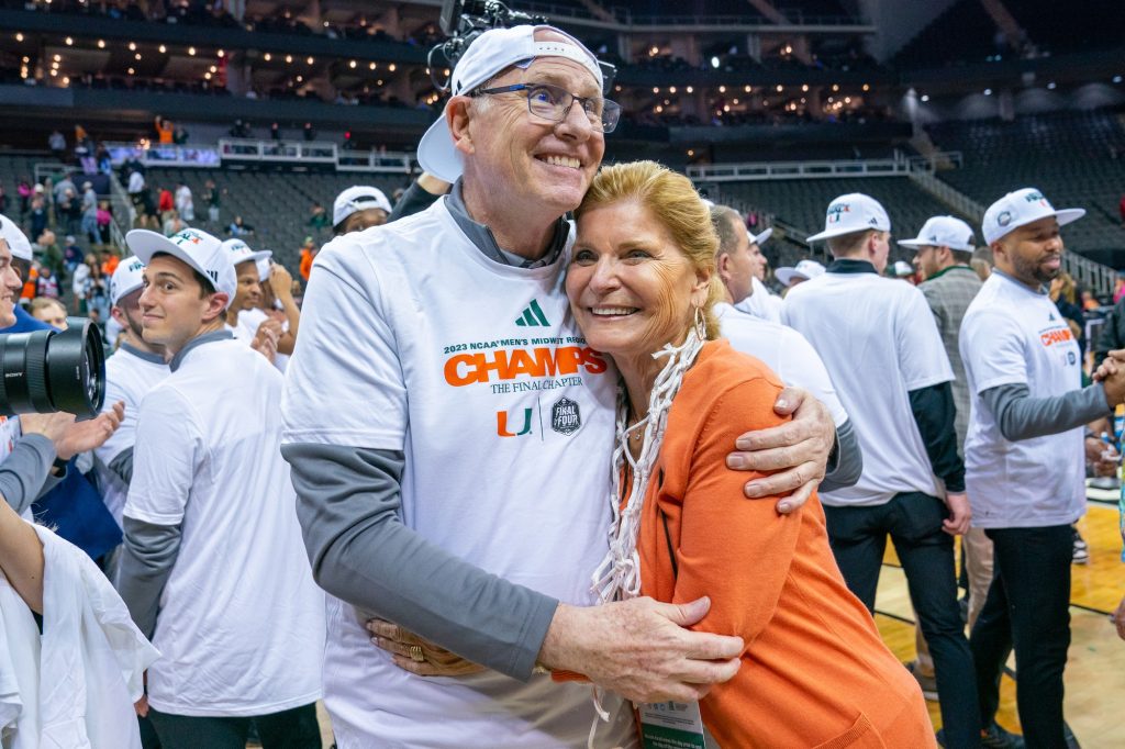 Head coach Jim Larrañaga celebrates with wife Liz Larrañaga after Miami’s 88-81 Elite Eight win over the University of Texas in the T-Mobile Center in Kansas City, MO on March 26, 2023.