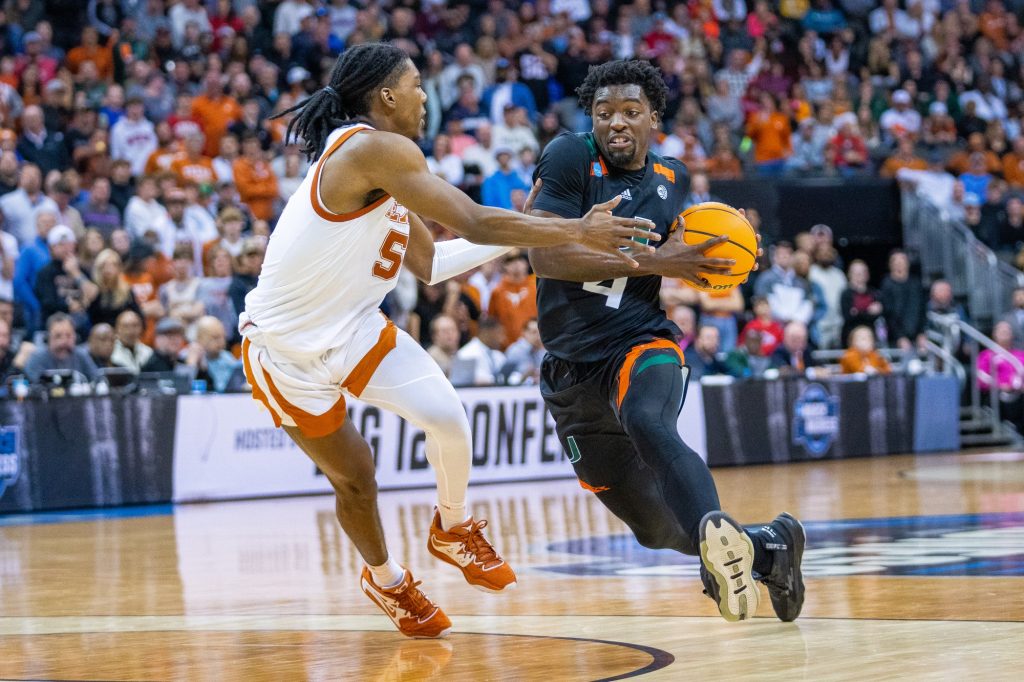 Sophomore guard Bensley Joseph drives to the basket during the second half of Miami’s Elite Eight matchup against the University of Texas in the T-Mobile Center in Kansas City, MO on March 26, 2023.