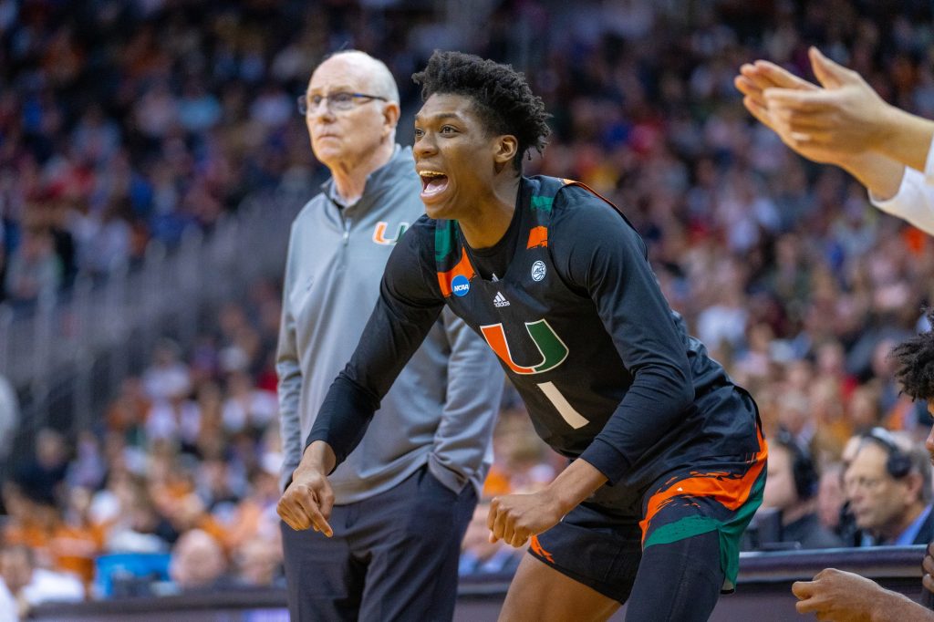 Fourth-year junior forward Anthony Walker cheers during the second half of Miami’s Elite Eight matchup against the University of Texas in the T-Mobile Center in Kansas City, MO on March 26, 2023.