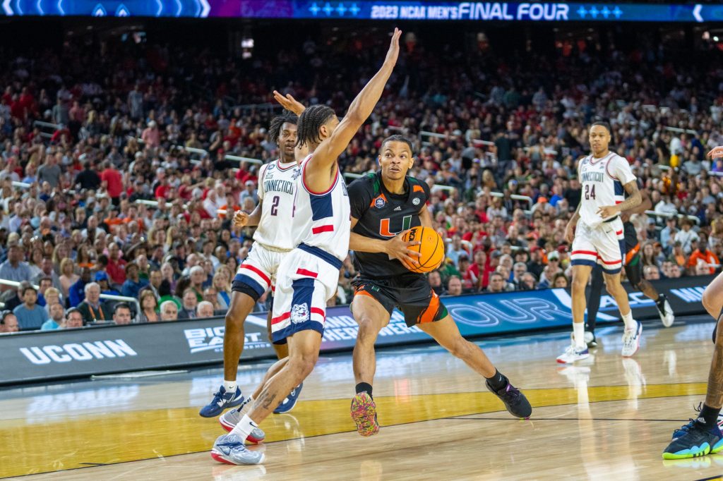 Fourth-year junior guard Isaiah Wong drives to the basket during the first half of Miami’s Final Four matchup against the University of Connecticut in NRG Stadium in Houston on April 1, 2023.
