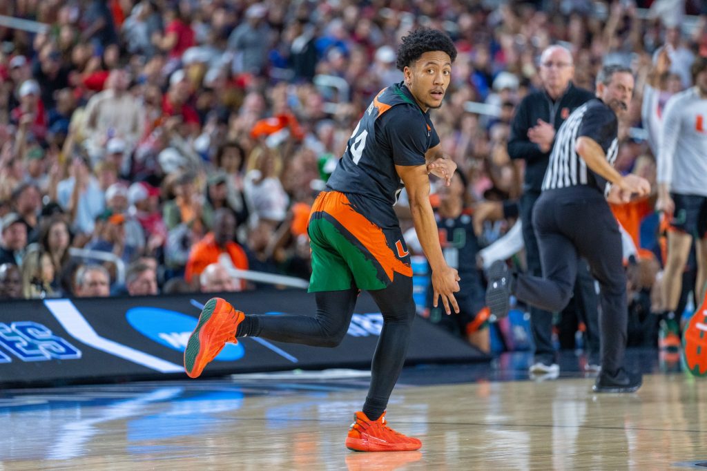 Third-year sophomore guard Nijel Pack celebrates a three pointer during the first half of their Final Four matchup against the University of Connecticut in NRG Stadium in Houston on April 1, 2023.