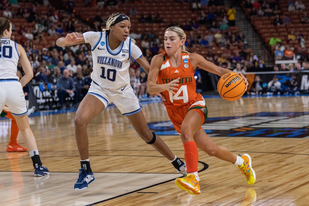 Senior guard Haley Cavinder drives the ball down the court in the third quarter of Miami's matchup against Villanova in the Bon Secours Wellness Arena in Greenville, S.C.