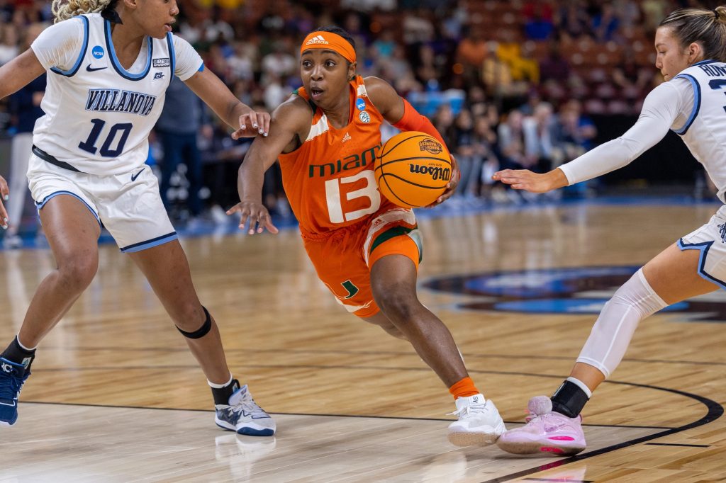 Sophomore guard Lashae Dwyer drives through the Wildcats in the fourth quarter of Miami’s Sweet Sixteen matchup against Villanova in the Bon Secours Wellness Arena on Friday, Mar. 24.