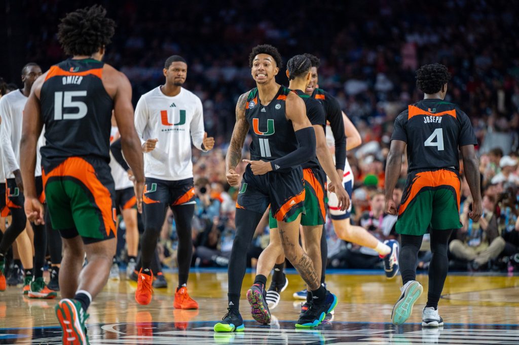 Fifth-year senior guard Jordan Miller celebrates a three-point shot during the second half of Miami's Final Four loss on Saturday, April 1 at the NRG Stadium.