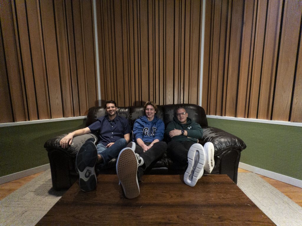 UM alum Erik Gunnarsson, David Vandelay, and UM alum Camilo Salas sit in the recording studio in Miami. Photo credit: Valeria Peñaranda