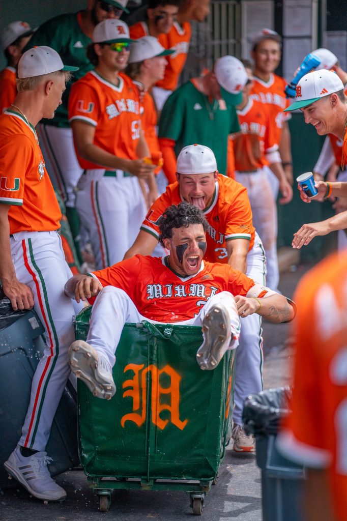 Junior infielder Yohandy Morales celebrates his home run in the dugout at the top of the seventh inning of Miami’s Coral Gables Regional game versus the University of Louisiana at Mark Light Field on June 4, 2023.