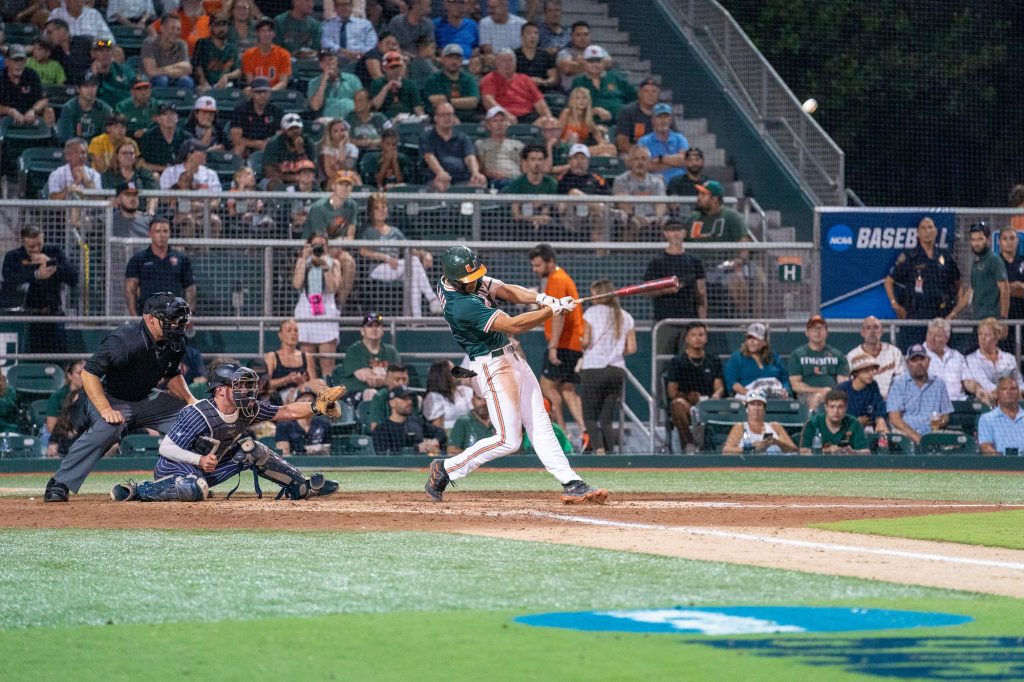 Junior infielder Yohandy Morales hits in the bottom of the fourth inning of Miami’s Coral Gables Regional game versus the University of Maine at Mark Light Field on June 2, 2023.