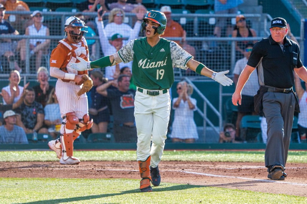 Junior infielder Dominic Pitelli hits a three-run home run at the top of the second inning of Miami’s Coral Gables Regional game versus the University of Texas at Mark Light Field on June 4, 2023.